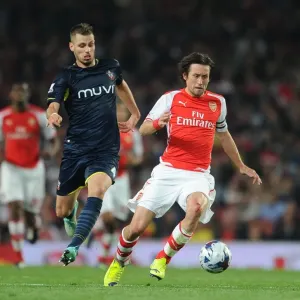 Arsenal's Rosicky Faces Off Against Southampton's Schneiderlin in League Cup Clash Arsenal's Rosicky Faces Off Against Southampton's Schneiderlin in League Cup Clash