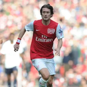 Arsenal's Rosicky Fights Bravely Against Tottenham in Intense Premier League Showdown (2011-12)