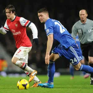 Arsenal's Rosicky Outmaneuvers Chelsea's Cahill in Premier League Clash