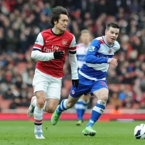 Arsenal's Rosicky Outmaneuvers Reading's Guthrie in Premier League Clash