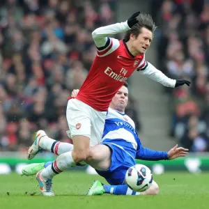 Arsenal's Rosicky Outsmarts Guthrie: A Premier League Battle at Emirates Stadium