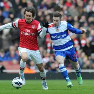 Arsenal's Rosicky Outsmarts Guthrie: A Premier League Showdown