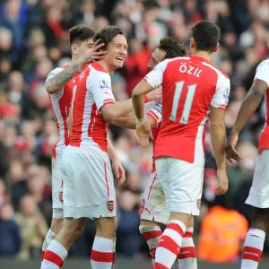 Arsenal's Rosicky and Ozil Celebrate Goals Against Everton in 2015 Premier League Match Arsenal's Rosicky and Ozil Celebrate Goals Against Everton in 2015 Premier League Match