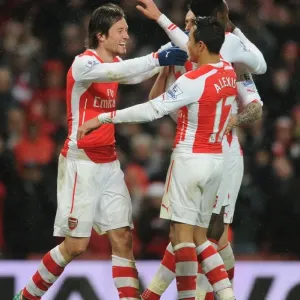 Arsenal's Rosicky and Sanchez Celebrate Goal Against Queens Park Rangers (2014-15) Arsenal's Rosicky and Sanchez Celebrate Goal Against Queens Park Rangers (2014-15)
