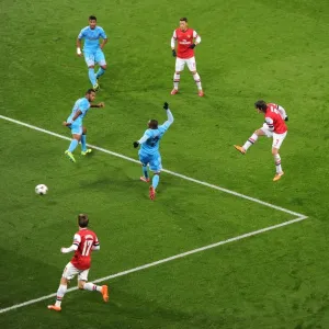 Arsenal's Rosicky Scores Past Marseille's Koulou and Abdallah in 2013-14 Champions League Arsenal's Rosicky Scores Past Marseille's Koulou and Abdallah in 2013-14 Champions League