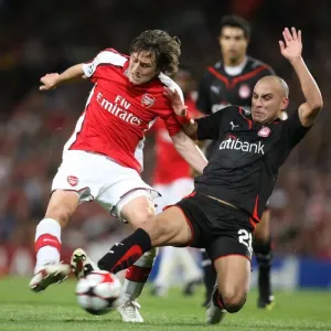 Arsenal's Rosicky vs. Ledesma: Arsenal's 2-0 Victory Over Olympiacos in the UEFA Champions League, Emirates Stadium, 2009