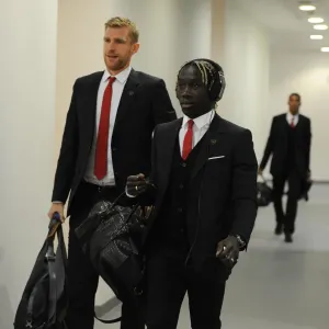 Arsenal's Sagna and Mertesacker Before Arsenal v Liverpool (2013-14) Arsenal's Sagna and Mertesacker Before Arsenal v Liverpool (2013-14)
