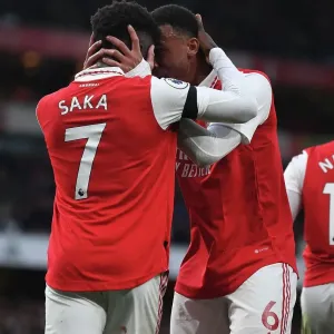 Arsenal's Saka and Gabriel in Action: A Battle at Emirates Stadium, Arsenal vs. Brentford, Premier League 2022-23 Arsenal's Saka and Gabriel in Action: A Battle at Emirates Stadium, Arsenal vs. Brentford, Premier League 2022-23