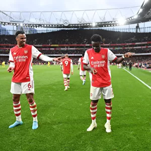 Arsenal's Saka and Gabriel Celebrate Second Goal Against Brentford (2021-22)