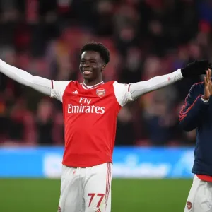 Arsenal's Saka and Nketiah Celebrate Victory Over Newcastle United Arsenal's Saka and Nketiah Celebrate Victory Over Newcastle United