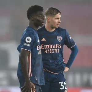 Arsenal's Saka and Smith Rowe in Action at Empty Southampton Stadium (Southampton v Arsenal, 2021-22 Premier League)