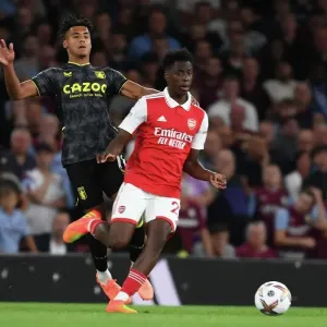 Arsenal's Sambi Outmaneuvers Aston Villa's Ollie Watkins in 2022-23 Premier League Clash Arsenal's Sambi Outmaneuvers Aston Villa's Ollie Watkins in 2022-23 Premier League Clash