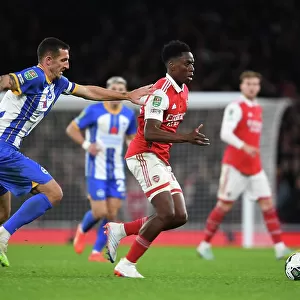 Arsenal's Sambi Outmaneuvers Brighton's Dunk in Carabao Cup Clash