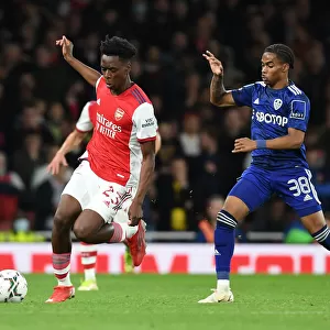 Arsenal's Sambi Outmaneuvers Leeds Summerville in Carabao Cup Clash