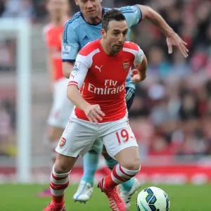 Arsenal's Santi Cazorla Dashes Past West Ham's Kevin Nolan in Premier League Clash