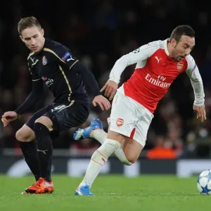 Arsenal's Santi Cazorla Outshines Marko Rog: A Dazzling Moment from the 2015-16 Champions League Clash Arsenal's Santi Cazorla Outshines Marko Rog: A Dazzling Moment from the 2015-16 Champions League Clash
