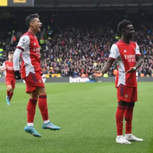 Arsenal's Sensational Young Stars: Saka and Martinelli Celebrate Victory Over Watford in the Premier League 2021-22 Arsenal's Sensational Young Stars: Saka and Martinelli Celebrate Victory Over Watford in the Premier League 2021-22