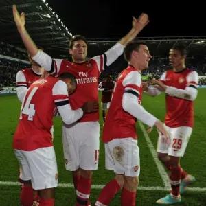 Arsenal's Six-Goal Rampage: Walcott, Giroud, Koscielny, and Chamakh Celebrate in Reading's Madejski Stadium (Capital One Cup 2012-13)
