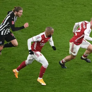 Arsenal's Smith Rowe and Lacazette Sprint Past Newcastle's Hendrick in FA Cup Clash Arsenal's Smith Rowe and Lacazette Sprint Past Newcastle's Hendrick in FA Cup Clash