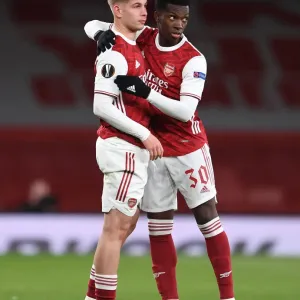 Arsenal's Smith Rowe and Nketiah Celebrate Semi-Final Victory Over Villarreal in Empty Emirates Stadium Arsenal's Smith Rowe and Nketiah Celebrate Semi-Final Victory Over Villarreal in Empty Emirates Stadium