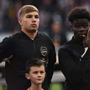 Arsenal's Smith Rowe and Saka Prepare for Eintracht Frankfurt Clash in Europa League (Group F)