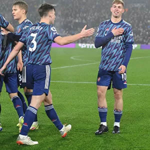 Arsenal's Smith Rowe and Tierney Celebrate Fourth Goal Against Leeds United (Premier League 2021-22)