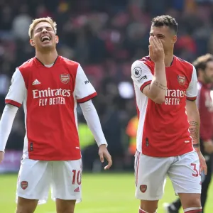 Arsenal's Smith Rowe and Xhaka Celebrate Victory Over Manchester United in 2021-22 Premier League Arsenal's Smith Rowe and Xhaka Celebrate Victory Over Manchester United in 2021-22 Premier League