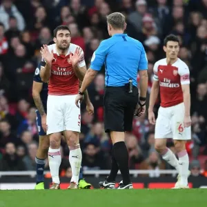 Arsenal's Sokratis Clashes with Referee during Arsenal v Fulham Premier League Match