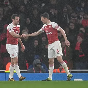 Arsenal's Sokratis and Koscielny: A Defensive Duo in Action against Manchester United (2018-19)
