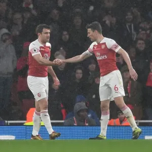 Arsenal's Sokratis and Koscielny: A Defensive Duo in Action against Manchester United (2018-19)