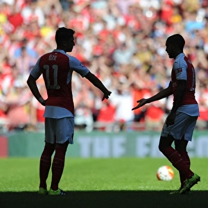 Arsenal's Star Duo: Ozil and Walcott Shine at the FA Community Shield vs. Chelsea (2015)