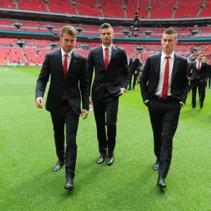 Arsenal's Stars: Ramsey, Giroud, and Koscielny Before FA Cup Final vs. Hull City (2014)