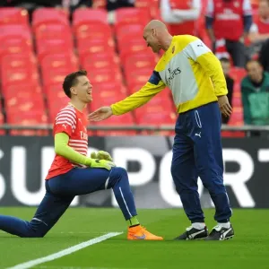 Arsenal's Szczesny and Bould Share a Light-Hearted Moment Before FA Cup Semi-Final vs. Reading