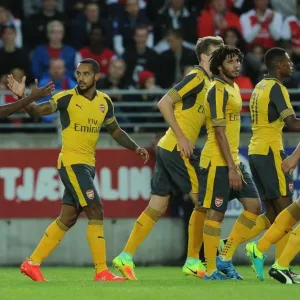 Arsenal's Theo Walcott and Alex Iwobi Celebrate Goal Against Viking FK (2016-17)