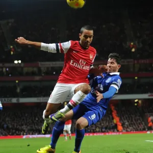 Arsenal's Theo Walcott Faces Off Against Everton's Bryan Oviedo in Premier League Clash Arsenal's Theo Walcott Faces Off Against Everton's Bryan Oviedo in Premier League Clash