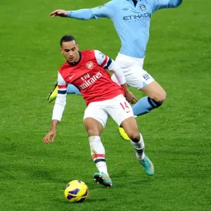 Arsenal's Theo Walcott Fends Off Manchester City's Matija Nastasic in Premier League Clash Arsenal's Theo Walcott Fends Off Manchester City's Matija Nastasic in Premier League Clash