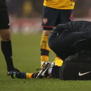 Arsenals Theo Walcott injured after a challenge by