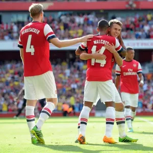Arsenal's Theo Walcott, Per Mertesacker, and Aaron Ramsey Celebrate Goal Against Galatasaray (2013-14)