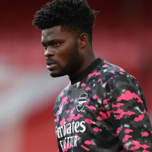 Arsenal's Thomas Partey Before Empty Emirates Stadium in UEFA Europa League Semi-Final vs Villarreal CF Arsenal's Thomas Partey Before Empty Emirates Stadium in UEFA Europa League Semi-Final vs Villarreal CF