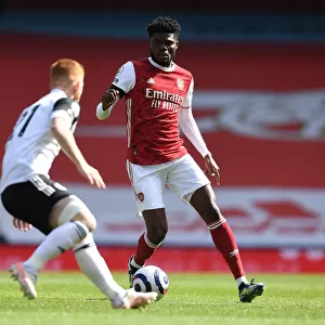 Arsenal's Thomas Partey Faces Off Against Fulham's Harrison Reed in Empty Emirates Stadium, Premier League 2020-21