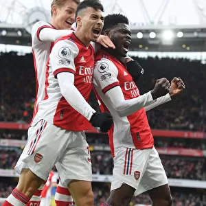 Arsenal's Thomas Partey, Gabriel Martinelli, and Martin Odegaard Celebrate Goal Against Leicester City (2021-22)