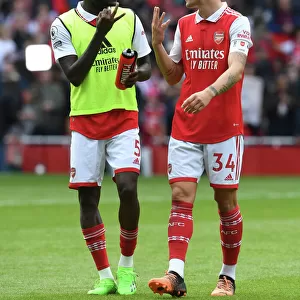 Arsenal's Thomas Partey and Granit Xhaka Share a Moment After Arsenal v Tottenham Rivalry