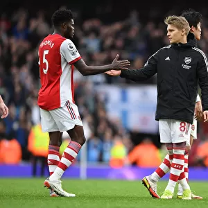 Arsenal's Thomas Partey and Martin Odegaard Celebrate after Beating Manchester City (Arsenal v Manchester City 2021-22)