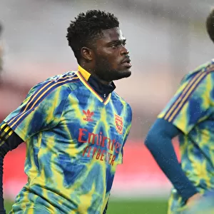 Arsenal's Thomas Partey Prepares for Manchester United Clash in Empty Old Trafford (2020-21 Premier League)