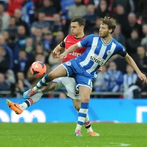 Arsenal's Thomas Vermaelen Faces Off Against Wigan's Nick Powell in FA Cup Semi-Final Showdown Arsenal's Thomas Vermaelen Faces Off Against Wigan's Nick Powell in FA Cup Semi-Final Showdown