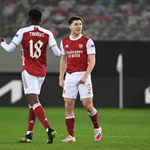 Arsenal's Tierney and Partey: United in Victory - Celebrating Goals in Europa League against SL Benfica