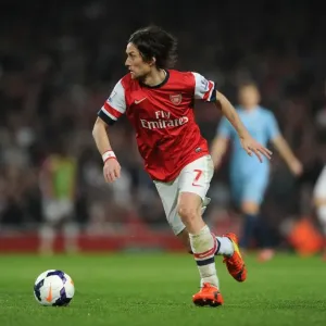 Arsenal's Tomas Rosicky in Action Against Manchester City (2014)