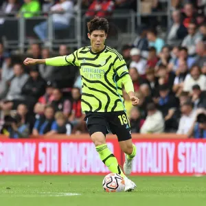 Arsenal's Tomiyasu in Action against AFC Bournemouth in 2023-24 Premier League Arsenal's Tomiyasu in Action against AFC Bournemouth in 2023-24 Premier League