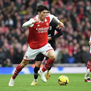 Arsenal's Tomiyasu in Action against AFC Bournemouth, Premier League 2022-23