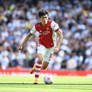 Arsenal's Tomiyasu in Action: Arsenal vs. Leeds United, Premier League 2021-22
